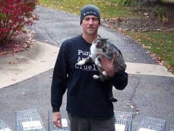 Toby Franks holding a cat